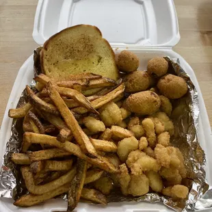 a tray of fries and a sandwich