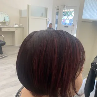 Bod haircut and  red rouge color