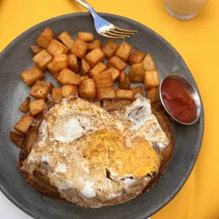 Croque madame with side of &quot;home fries with onions and peppers.&quot; No onions or peppers provided, and the egg was severely overdone.