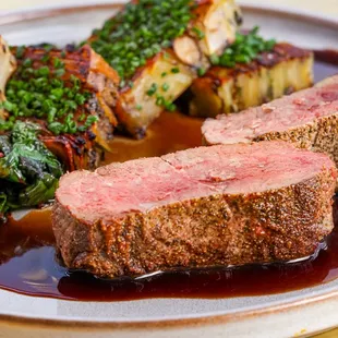 VENISON LOIN / Sunchoke Terrine / Swiss Chard / Pomegranate Demi