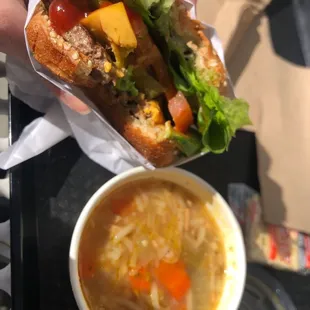 Cheeseburger and homemade chicken noodle soup