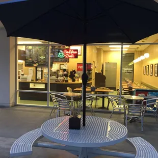 a table with an umbrella