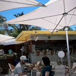 Outside dining by the water.