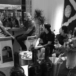 a group of people sitting around a table