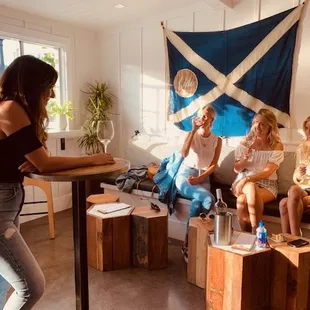 a group of people sitting around a table