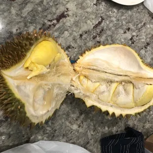Fresh durian fruit, not frozen.