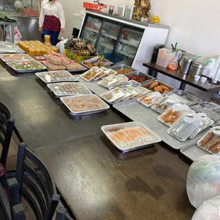 To go and catering food trays available throughout the day. Call ahead to order as well.