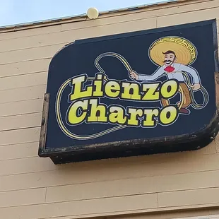a sign on the side of a building