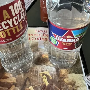 I made the mistake of bringing my own water bottle (left)In order to eat there you must buy their water bottle (right).