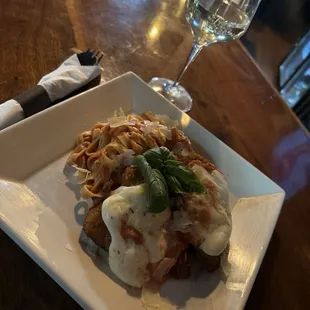 Chicken parm pasta and a glass of Pino