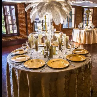 Ostrich feather Centerpieces...we brought these in . The venue does not have them.