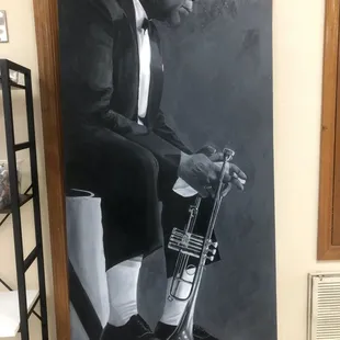 Oil painting of Louis Armstrong.