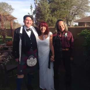 Bruce in his kilt, Tracy and I after our wedding