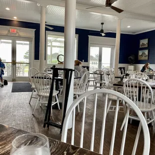 Interior of restaurant - single dining room, fairly small but quaint and cozy with a nice ambience and seaside decor ofc