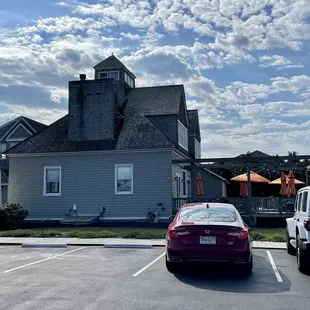 Outside of restaurant - this is a **real** restored, historic life saving station! So cute. Sits right on Sanderling property facing sound.
