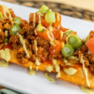 a plate of tasty looking nachos