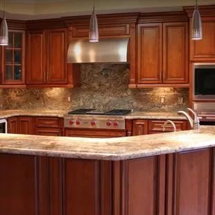 a kitchen with granite countertops