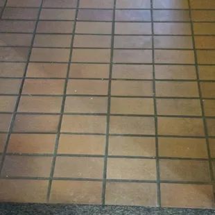 a tiled bathroom floor