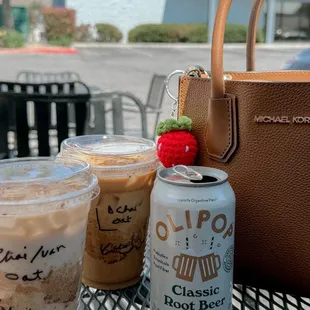 iced chais + olipop outside