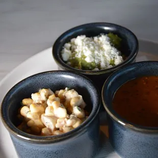 CSG dip (strewn corn, guacamole &amp; chipotle salsa) was served with multicolor tortilla chips