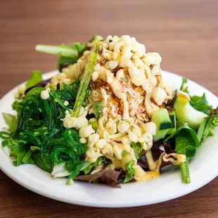 a plate of food on a wooden table