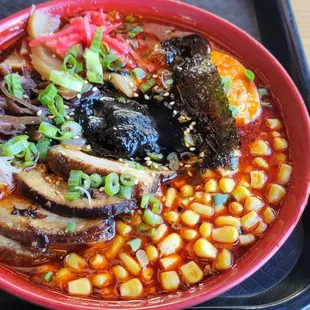 a bowl of ramen and beans