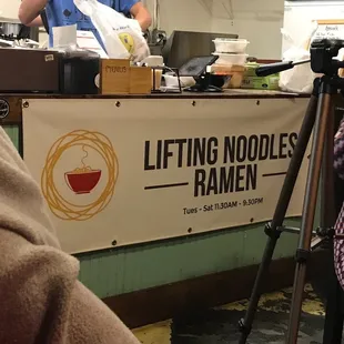 Sign at the Lifting Noodles Stand