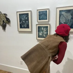 Cyanotypes by Karen Hymer. Clay art by Zoe Wolfe.