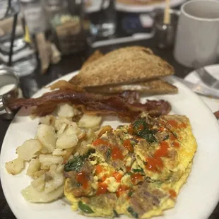 Omelet with bacon, spinach, jalapeño