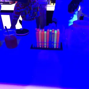 Vials of neon liquids