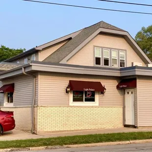 a red car parked outside