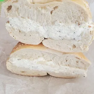 Sesame bagel with garlic herb cream cheese
