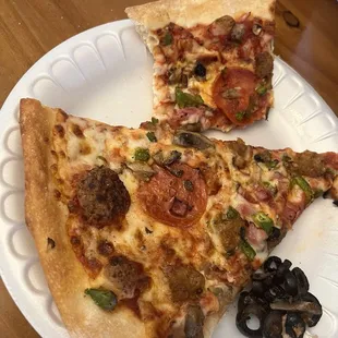 Supreme pizza (with black olives removed)