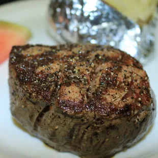 a piece of steak on a plate