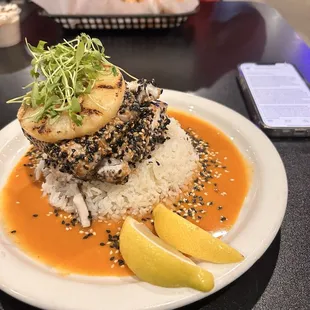 Cobia over rice with yellow curry. Good Lord this is amazing! 5 star food every single time!