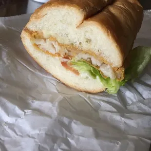 Inside of the fish poboy. Too much bread :/ fish sandwich is better