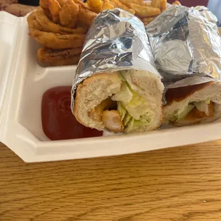 Shrimp Poboy, fries, and onion rings