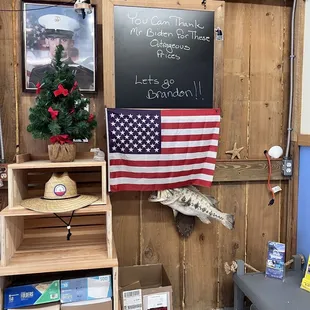 an american flag hanging on a wall