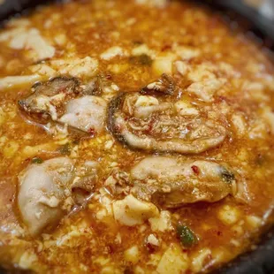 a close up of a bowl of tofu