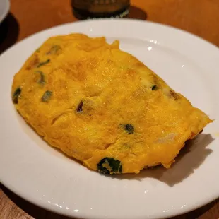 an omelet on a white plate