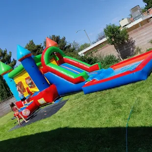 Full picture of medium sized water slide jumpy.