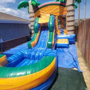 We have this awesome  13x25ft waterslide tropical combo