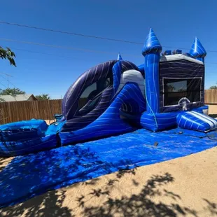 Huge blue waterslide for teens and smaller kids