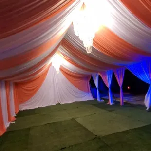 20x30 tent w/drapping and chandeliers