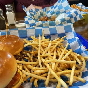 Sliders with shoe string fries.