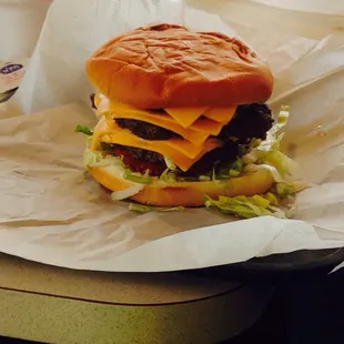 The guy next to me ordered the triple burger &amp; I asked him if I could get a picture! It was gone before I could get this posted!