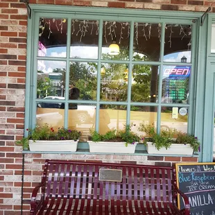 a bench outside a store