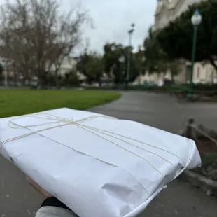 a person holding a piece of paper