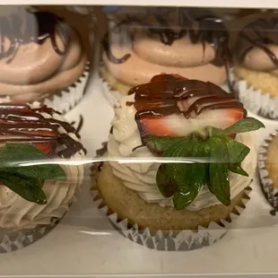 Vanilla Cupcakes vanilla and chocolate buttercream with chocolate ganache and strawberries on top