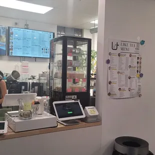 a woman working at a coffee shop